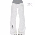 Fleece-lined white polka-dot sweatpants