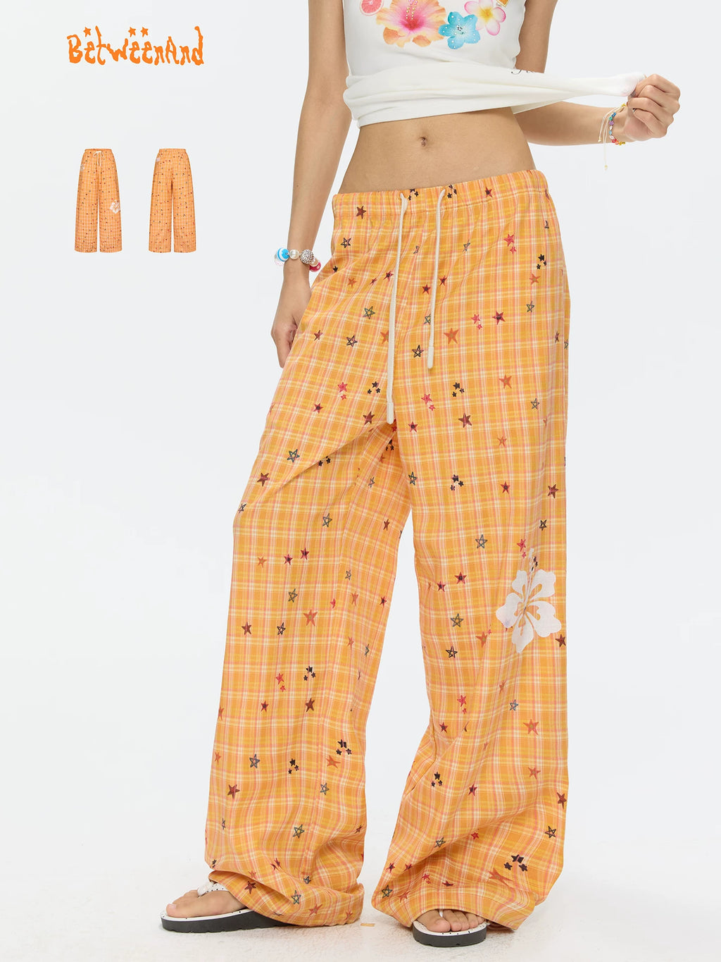 Orange checkered stars print pants