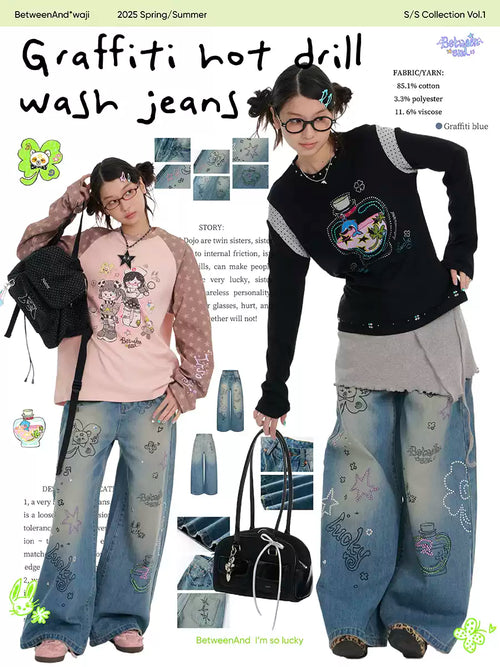 Blue graffiti print jeans with rhinestone details and washed finish